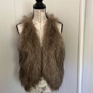 Super cool fun faux fur vest Size Medium.